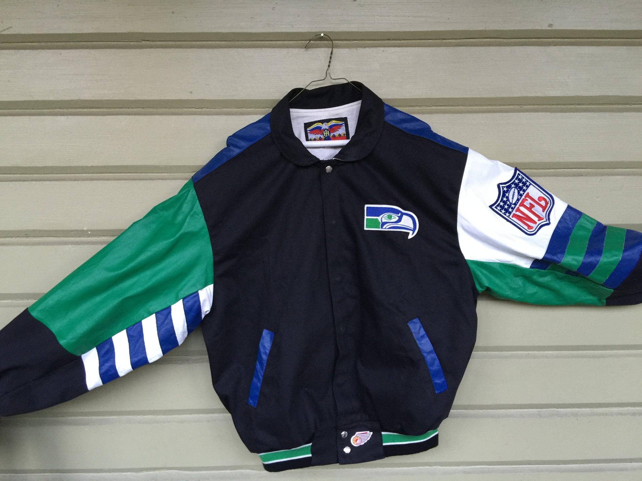 Vintage sports gear, vintage starter jackets, vintage letterman jacket